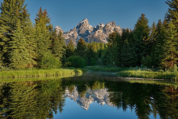 Grand Teton Range with reflection in river at Schwabacher Landing