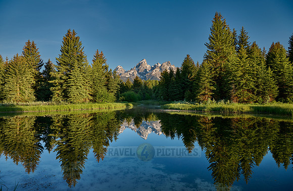 Grand Teton Range with reflection in river at Schwabacher Landing