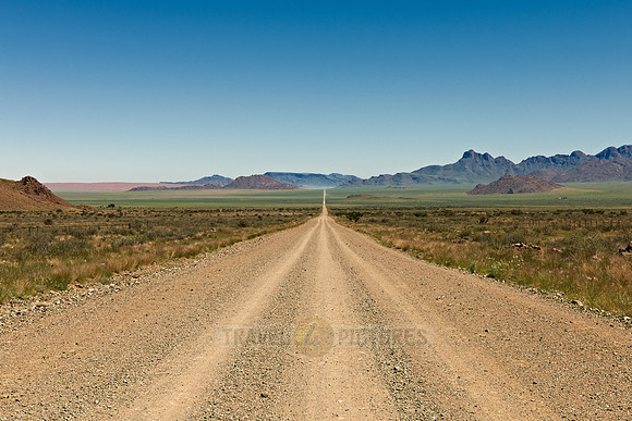 lonesome straight deserted gravel road