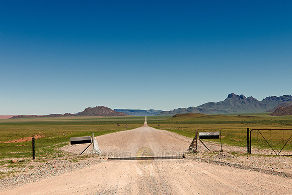 lonesome straight deserted gravel road