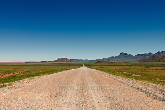 lonesome straight deserted gravel road