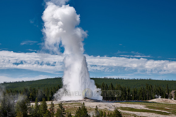 erupting Old Faithful Geyser, Yellowstone National Park, Wyoming