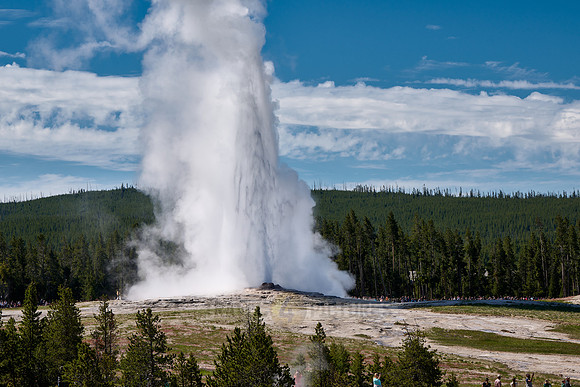 erupting Old Faithful Geyser, Yellowstone National Park, Wyoming