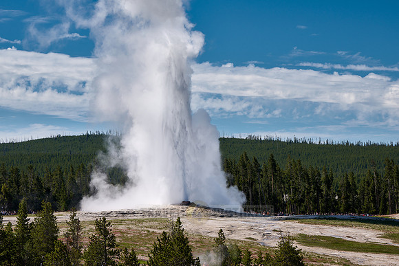 erupting Old Faithful Geyser, Yellowstone National Park, Wyoming