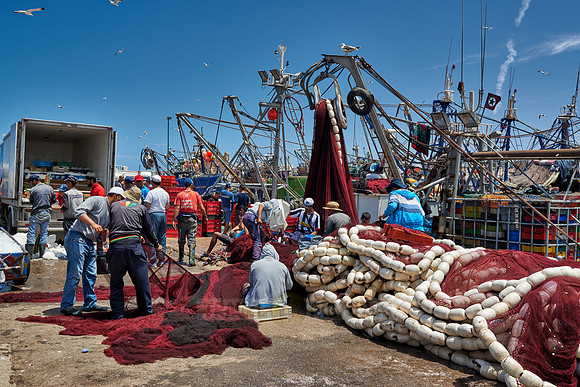 fishing nets and boats in harbor of Essaouira