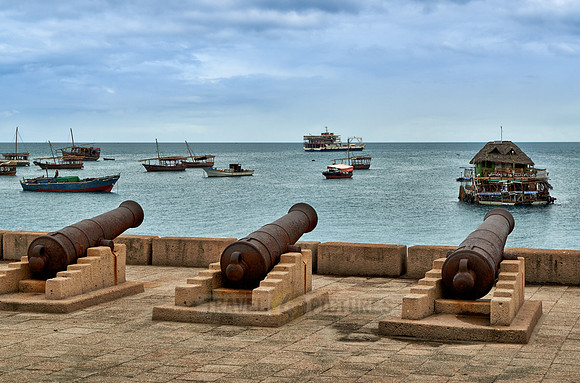 historical cannons in harbor of Stone Town