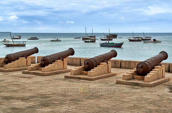 historical cannons in harbor of Stone Town