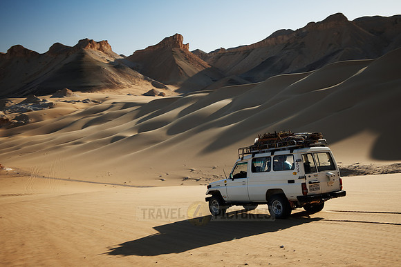 4x4 off road car drive across desert landscape