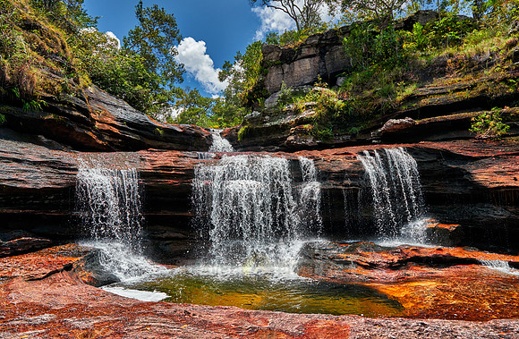a waterfall at Cano Cristales
