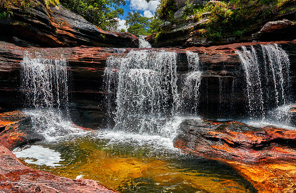a waterfall at Cano Cristales