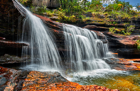 a waterfall at Cano Cristales