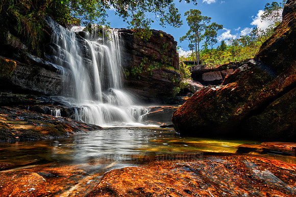 a waterfall at Cano Cristales