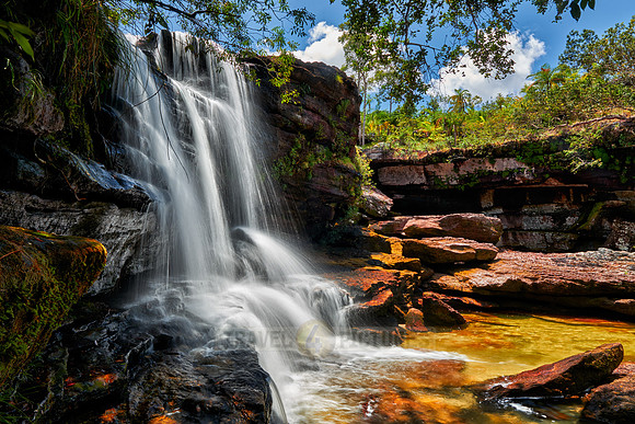 a waterfall at Cano Cristales