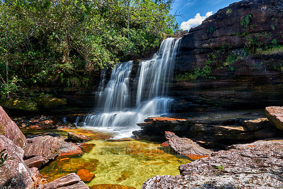 a waterfall at Cano Cristales
