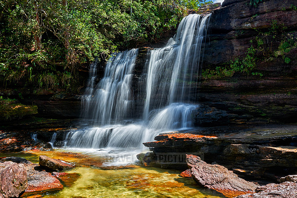 a waterfall at Cano Cristales