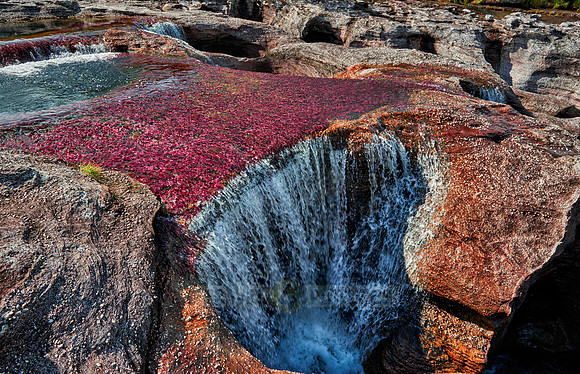 a waterfall at Cano Cristales