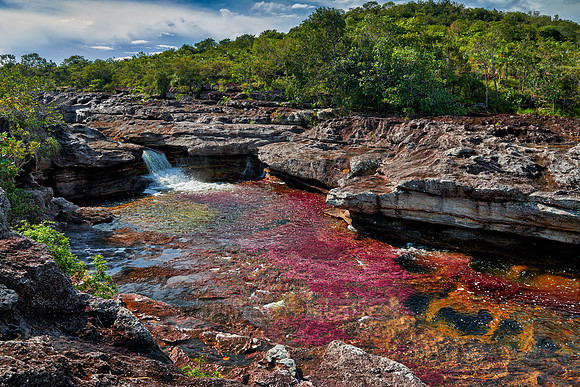 a waterfall at Cano Cristales