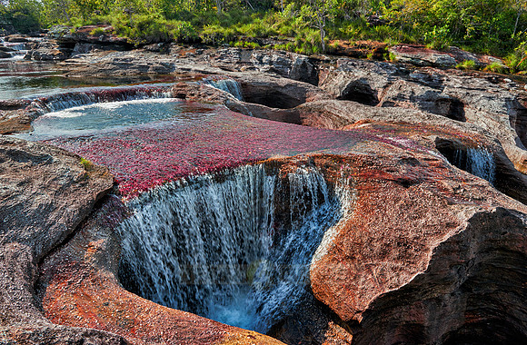 a waterfall at Cano Cristales