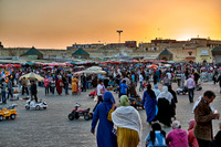 people on Lahdim Square at sunset