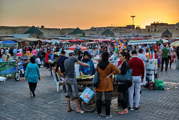 people on Lahdim Square at sunset