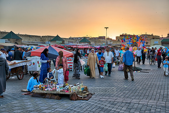 people on Lahdim Square at sunset