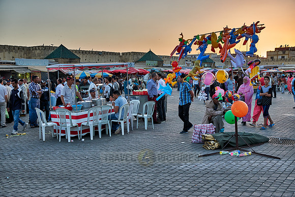 people on Lahdim Square at sunset