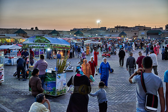 people on Lahdim Square at sunset