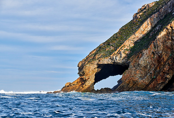 cliffs and cave at coastline