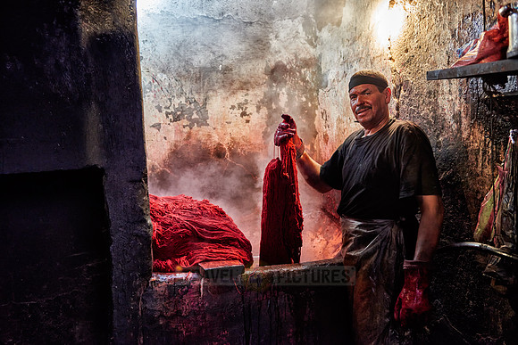 Wool dyer in workshop