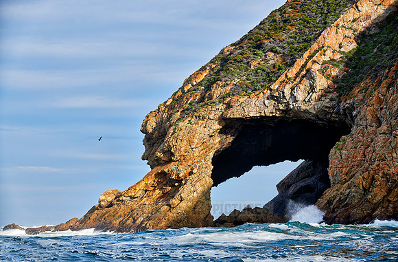 cliffs and cave at coastline