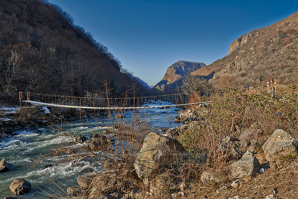 chain bridge over river Rami
