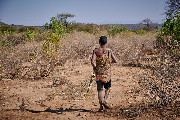 hunting bushmen of Hadza tribe with bow and arrow
