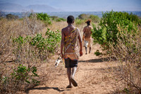 hunting bushmen of Hadza tribe with bow and arrow