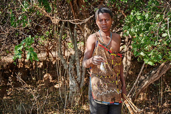 hunting bushmen of Hadza tribe with bow and arrow