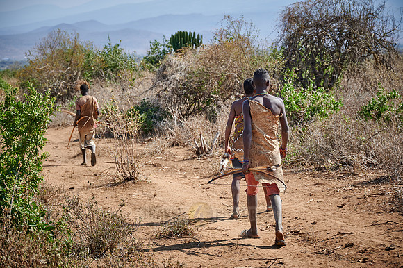 hunting bushmen of Hadza tribe with bow and arrow