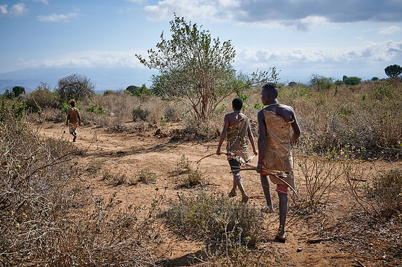 hunting bushmen of Hadza tribe with bow and arrow