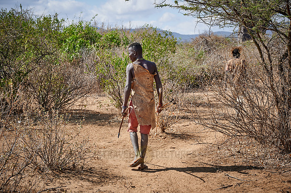 hunting bushmen of Hadza tribe with bow and arrow
