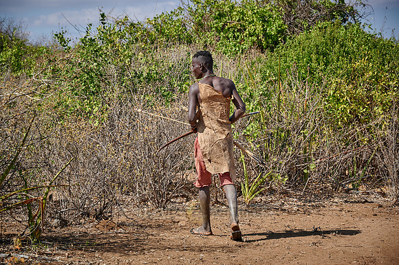 hunting bushmen of Hadza tribe with bow and arrow