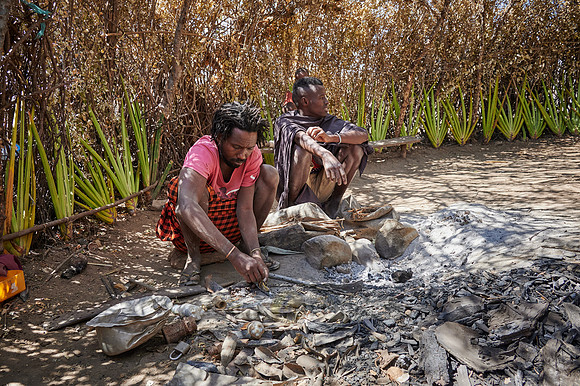 locals from Datoga tribe forge arrows