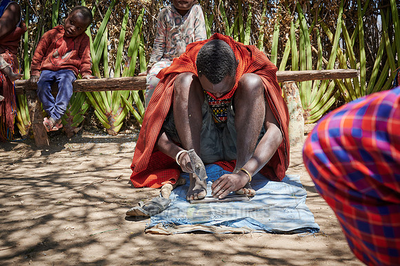 locals from Datoga tribe forge arrows