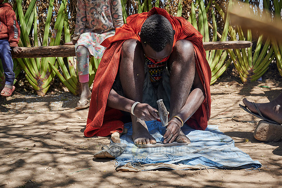 locals from Datoga tribe forge arrows