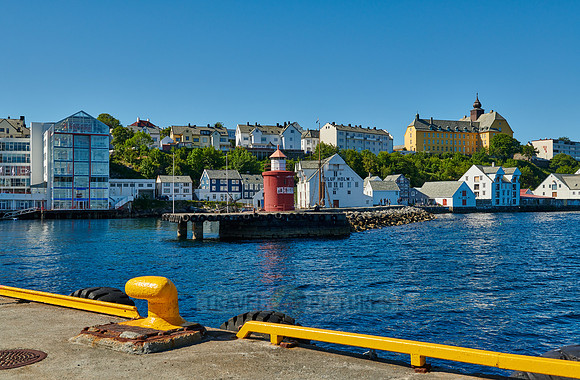 lighthouse at entrance of old harbor