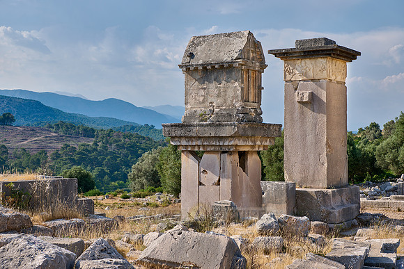 Sarcophagus and Harpy Pillar in ruins of ancient city Xanthos