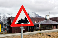 warning sign beware of snow scooter