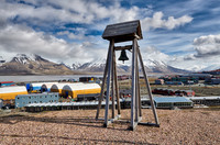 old bell tower in front of Longyearbyen