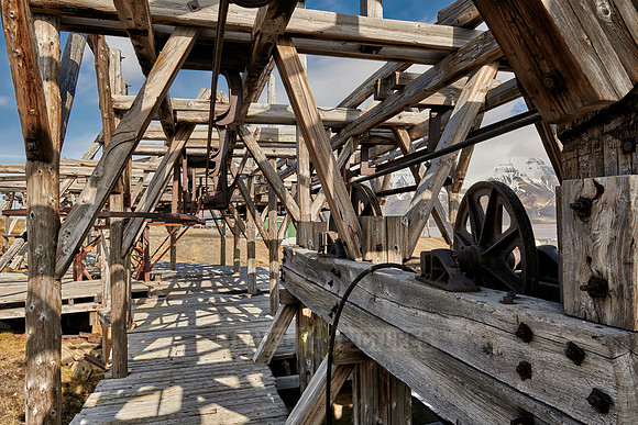 old wooden and rusty construction of a cable car for coal mining