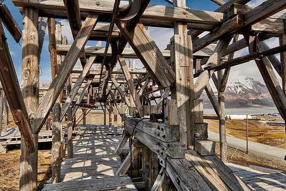old wooden and rusty construction of a cable car for coal mining