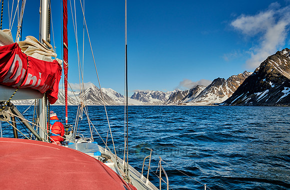 sail ship in front of landscape of Magdalenefjorden