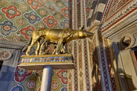 statue of wolf with Romulus and Remus, interior shot of Palazzo Pubblico