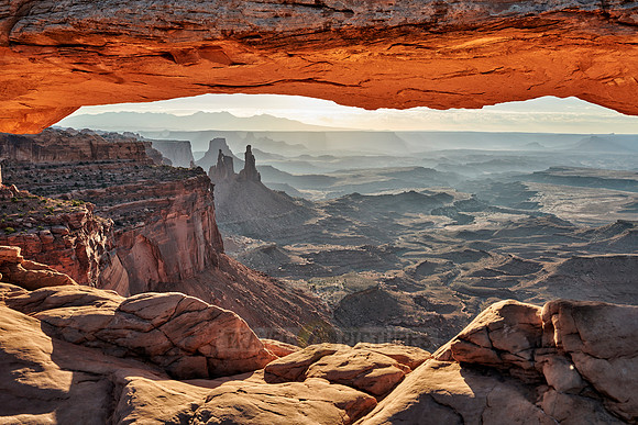 sun rises at Mesa Arch in Canyonlands National Park